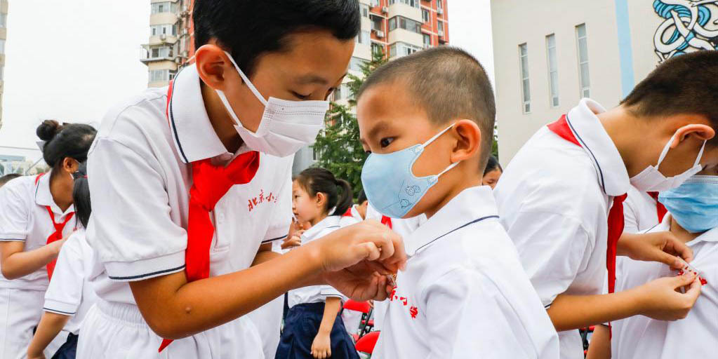 Escolas na China intensificam medidas preventivas contra COVID-19 para o novo ano letivo