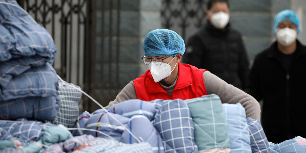 Trabalhadores da saúde na linha de frente não poupam esforços para combater a COVID-19 em Anyang