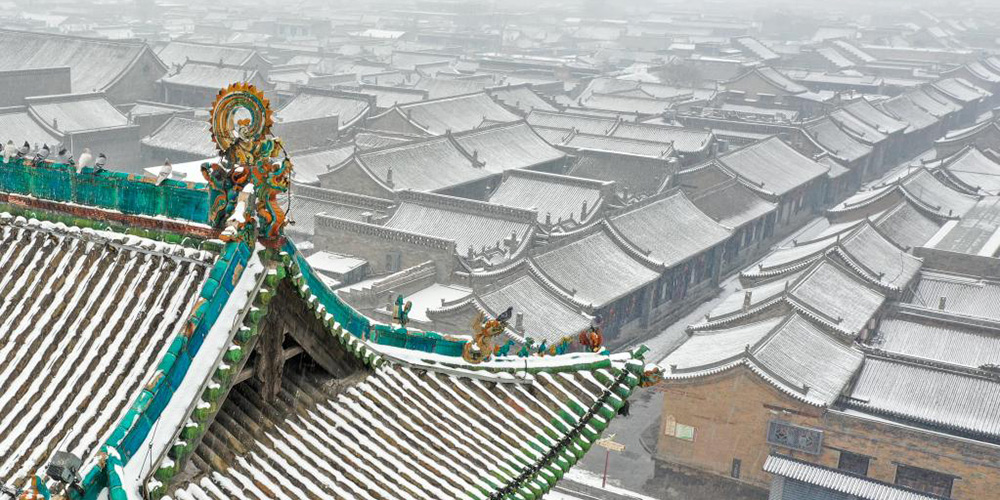 Neve branqueia a antiga cidade de Pingyao, em Shanxi